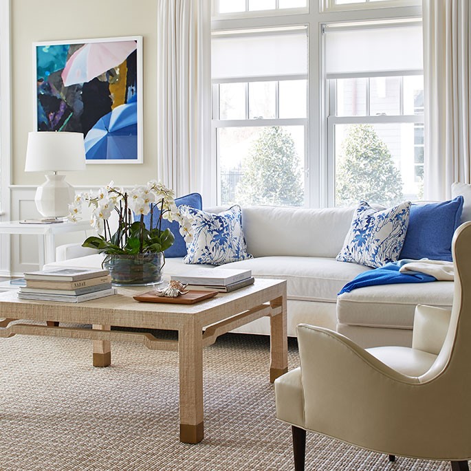 Couch and Chair with Flowers on Table